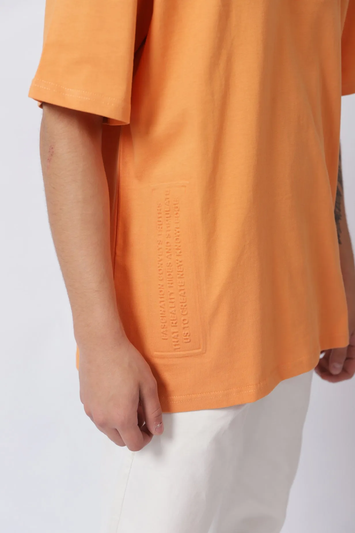 BAGGY FIT EMBOSSED GRAPHIC TEE